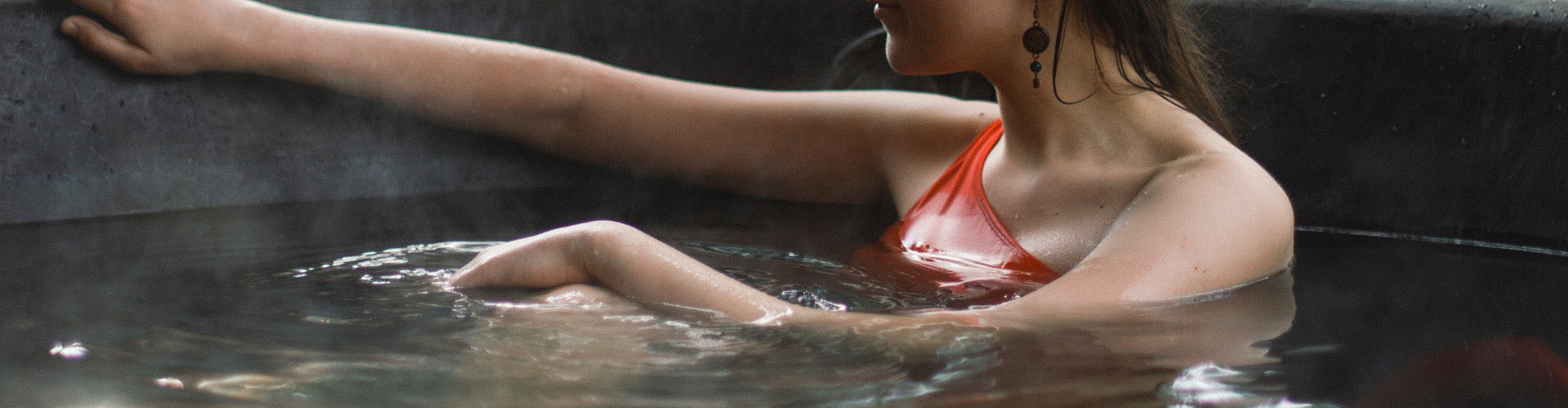 woman sitting in a hot tub