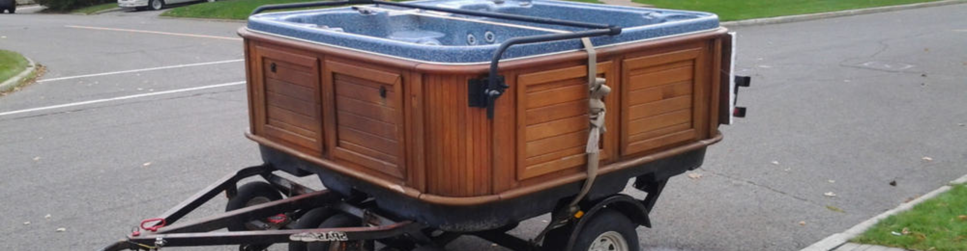 wooden hot tub on a moving trailer