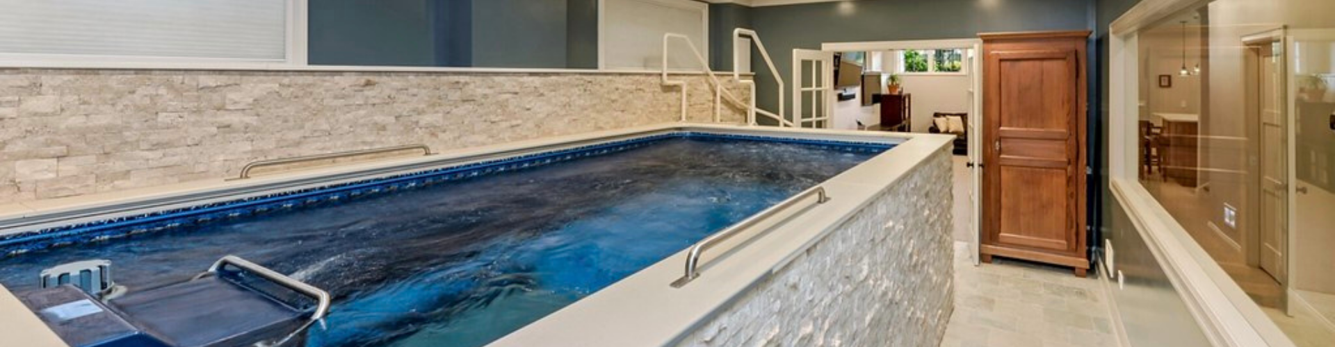 endless pool installed in a basement