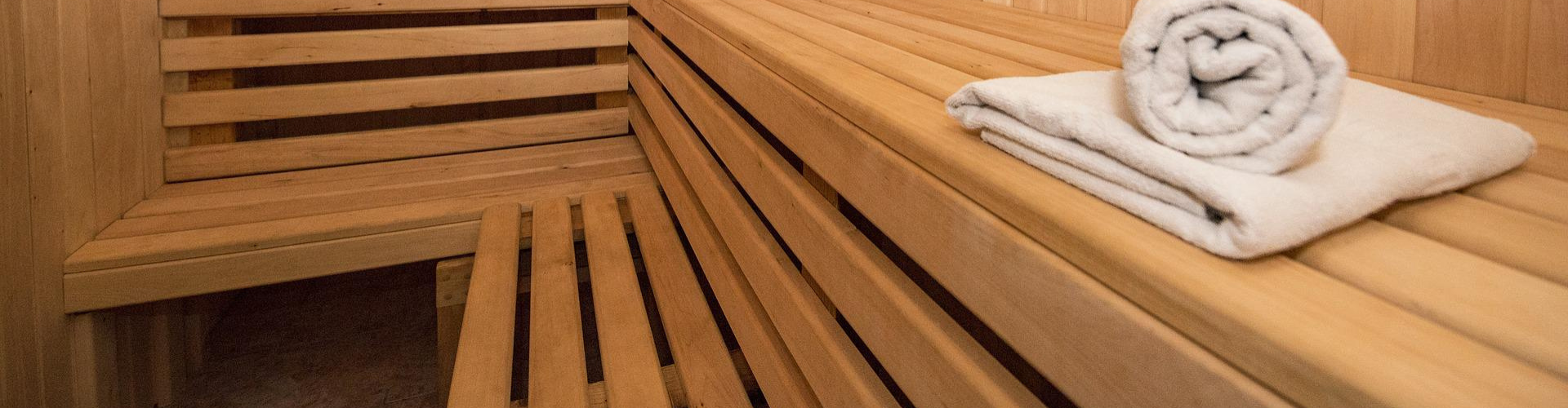close up of wooden sauna benches