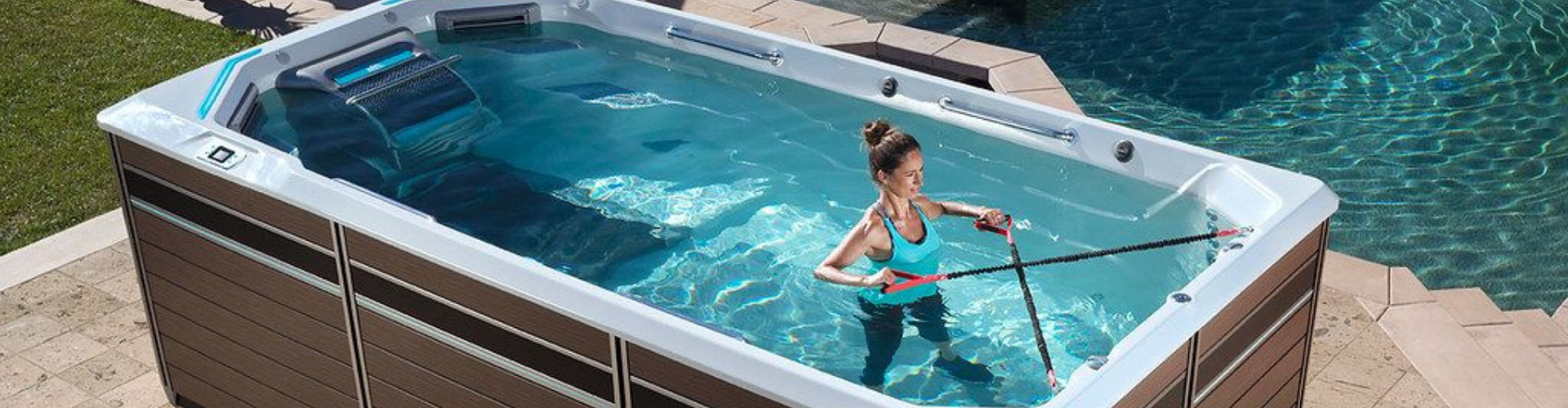 woman using resistance bands in a swim spa
